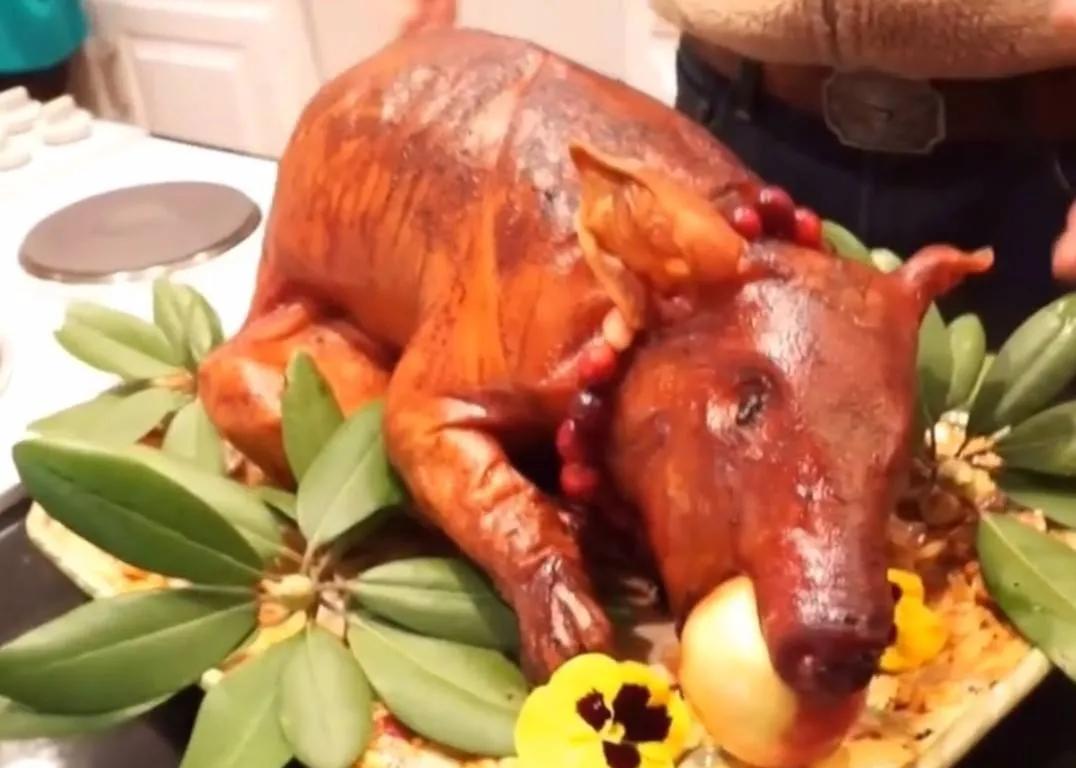 What is the origin of the apple in the mouth of the roast suckling pig ...