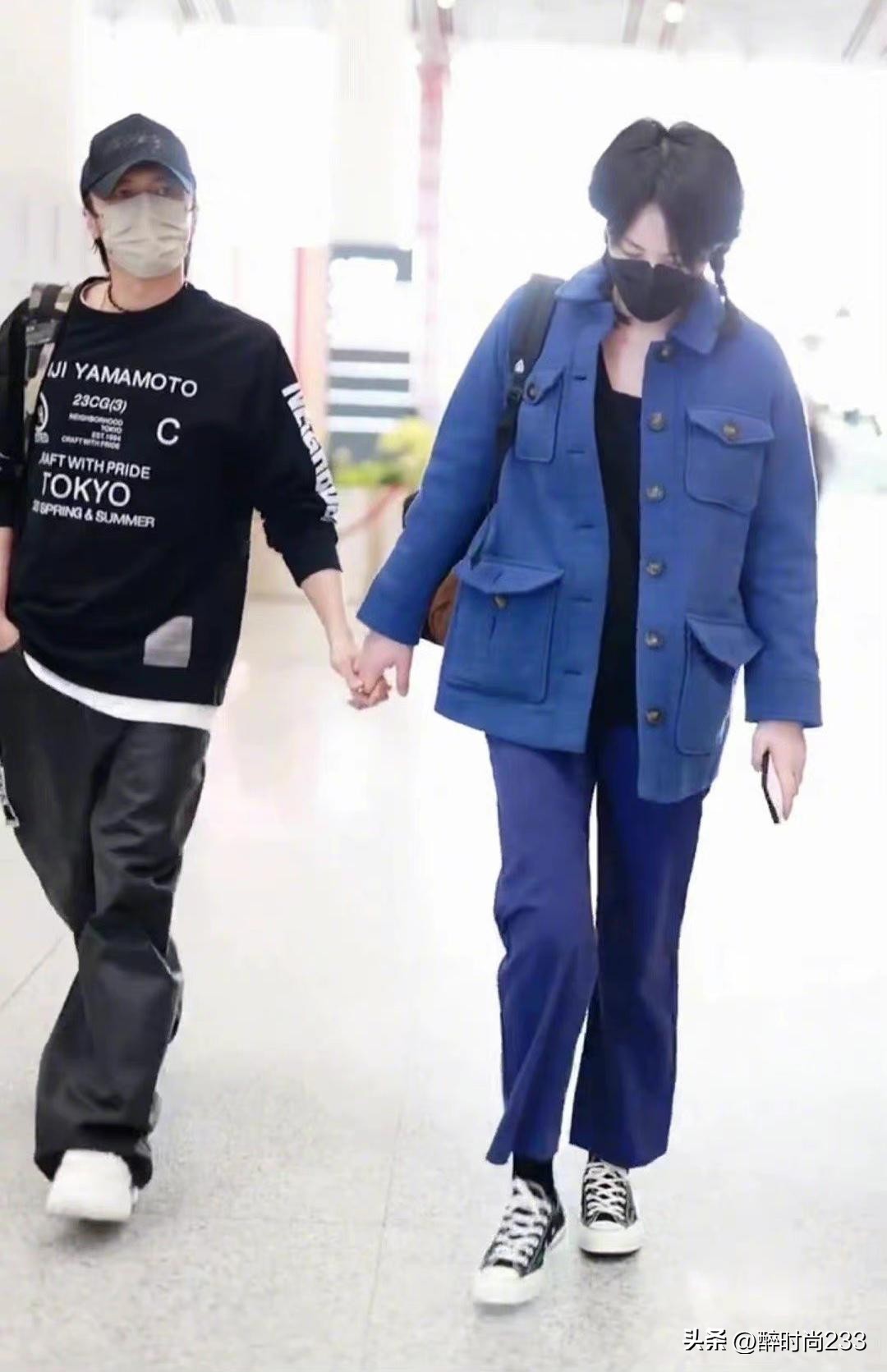 Faye Wong and Nicholas Tse appeared holding hands, the two were dressed ...