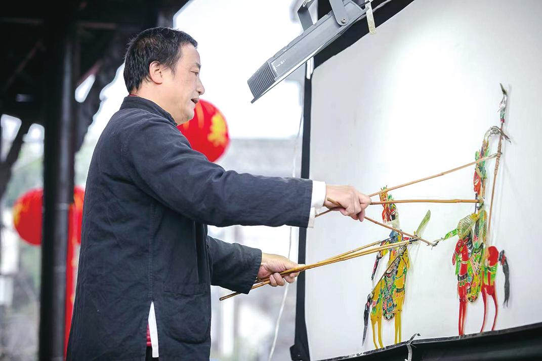 Zhou Jun Inheritance of the Millennium Shadow Puppet Family iNEWS